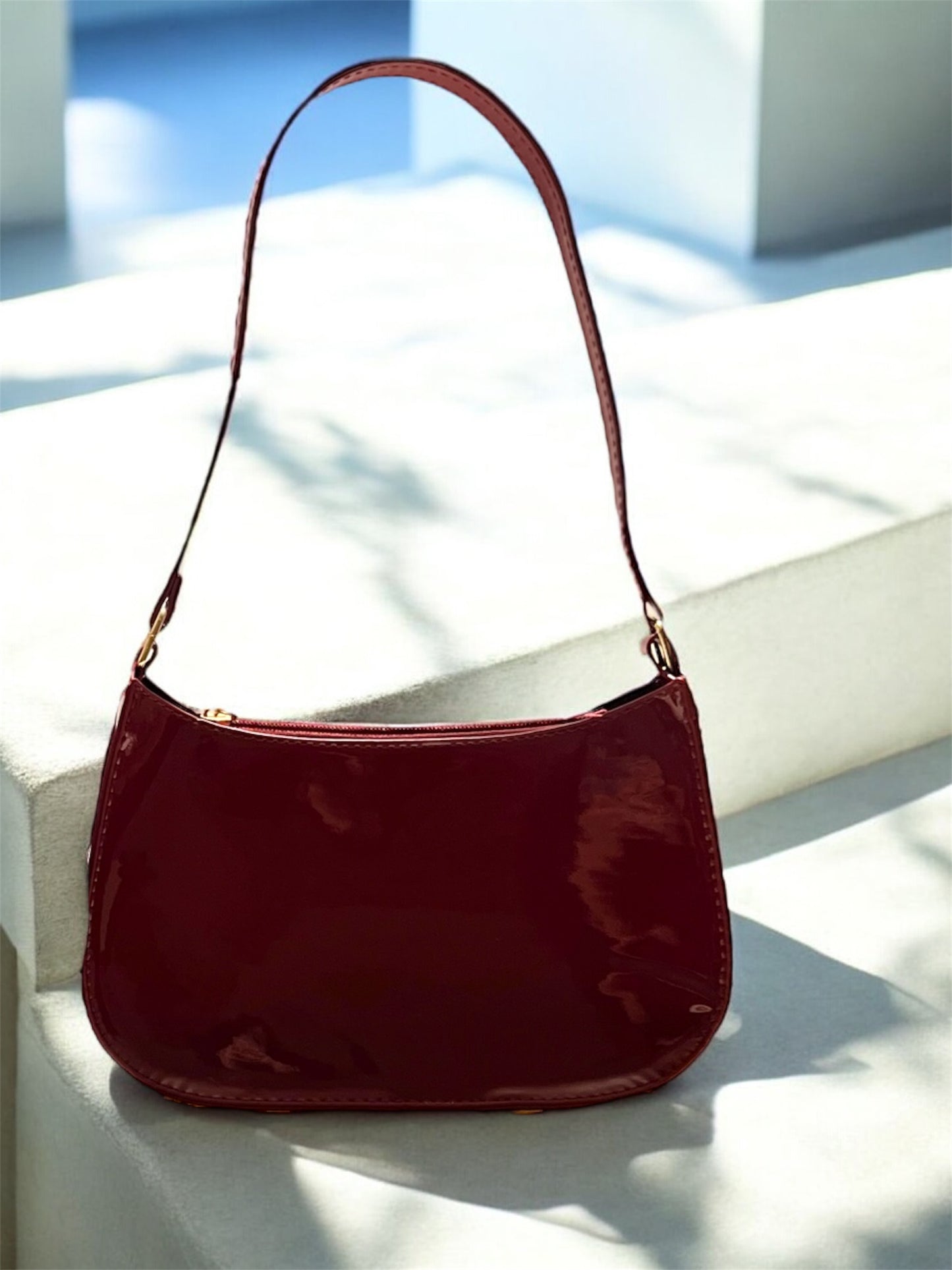 Maroon Patent leather bag