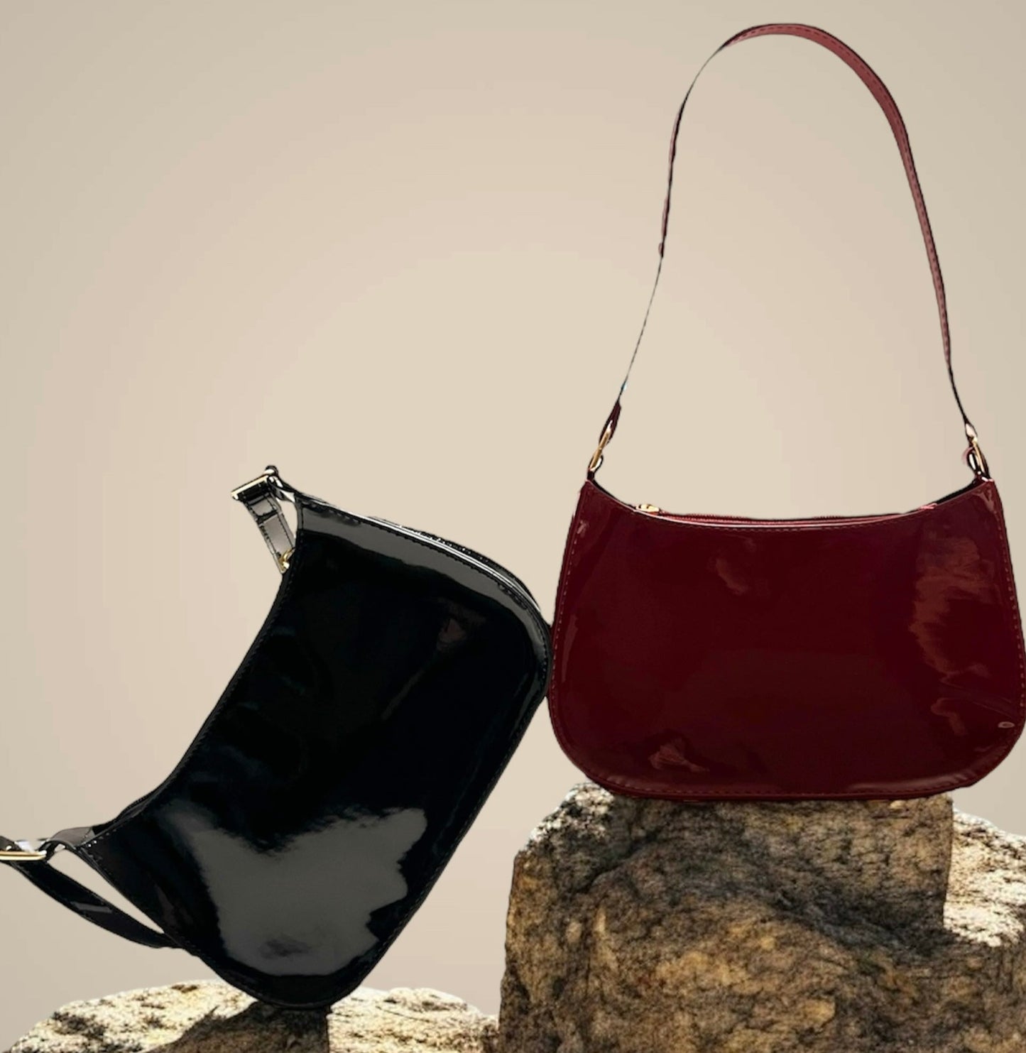 maroon and black patent leather shoulder bags