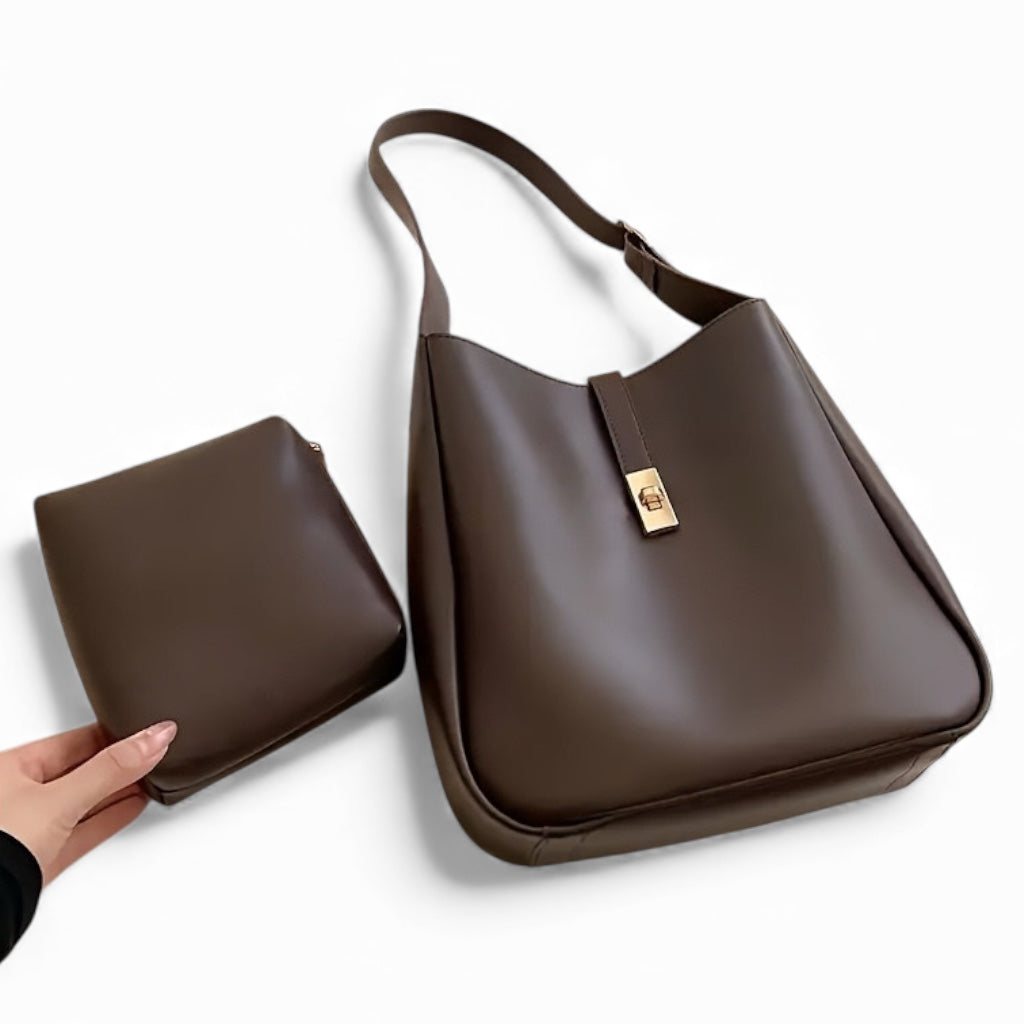 Brown handbag with matching pouch on a white background