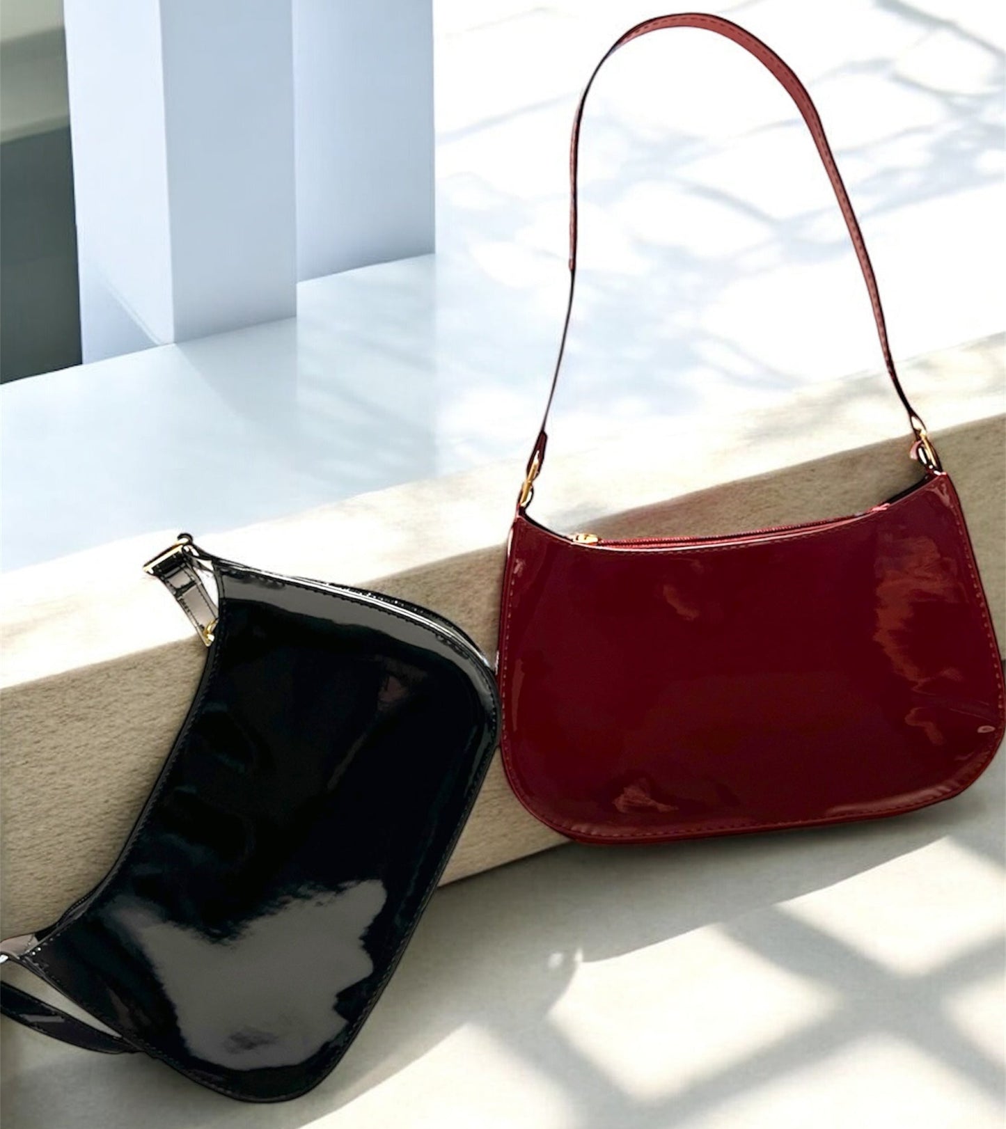 Maroon and black Patent leather bags