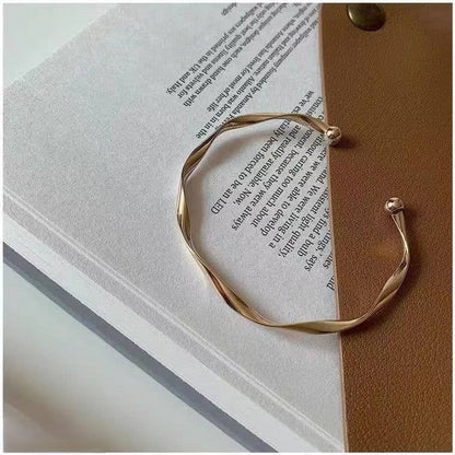 Curved Gold Bracelet