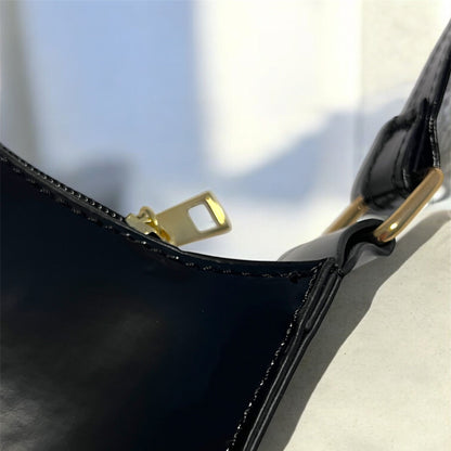 Black patent bag closeup
